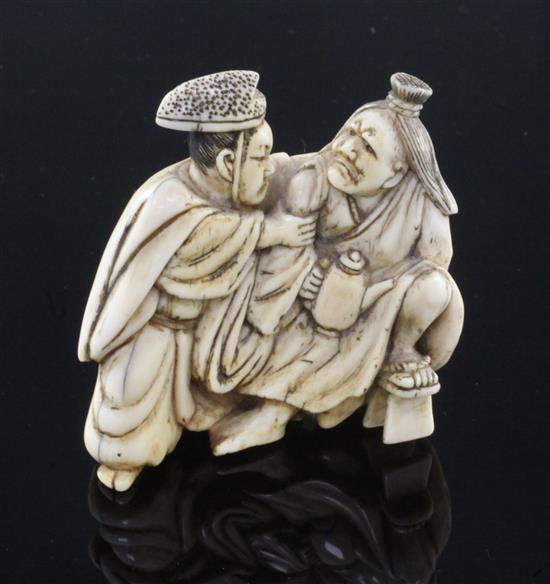 A Japanese ivory netsuke of Tadamori catching the oil thief, Edo period, 5.2cm